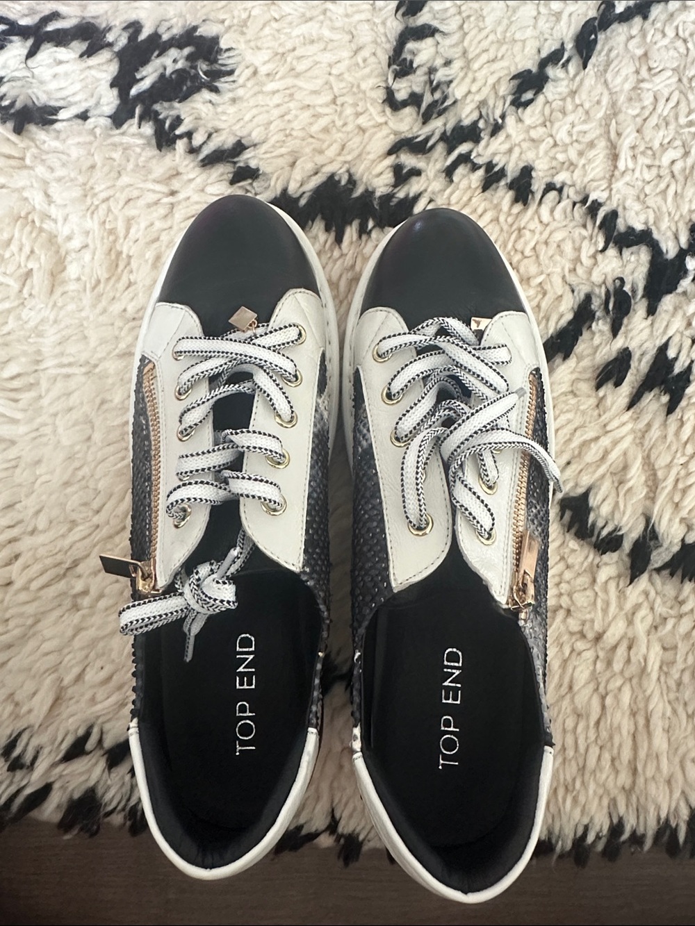 Women's Black and White Fashion Sneaker with Gold Trim